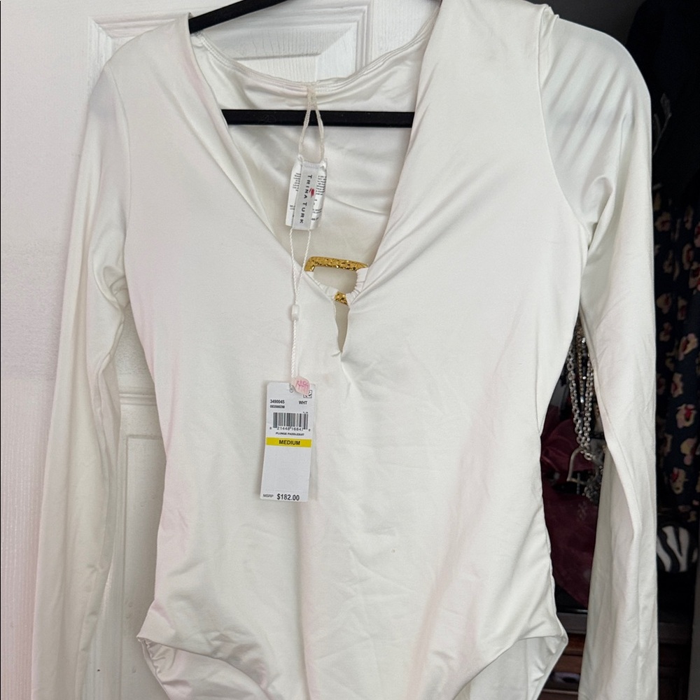 Trina Turk White Long-Sleeve V-Neck plunge paddle suit Bodysuit with Gold Accent